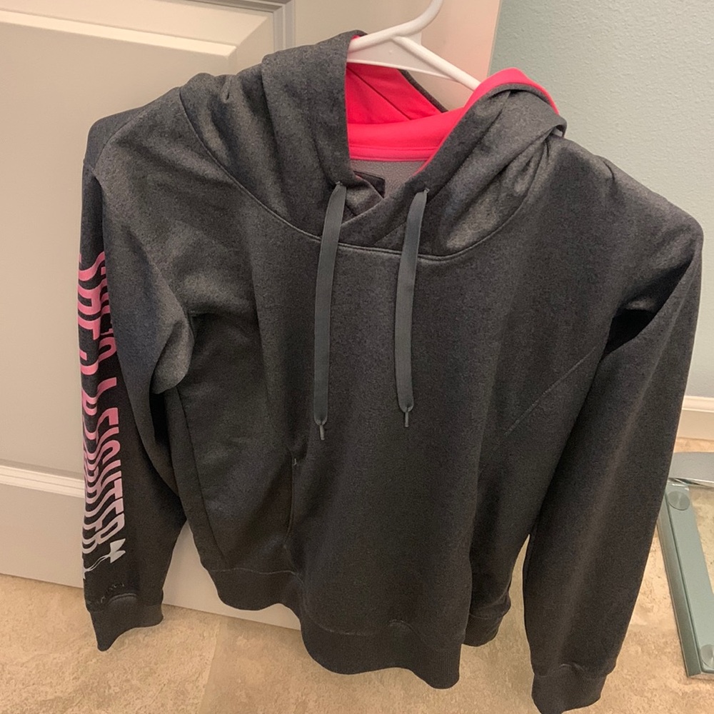 Used under armor hoodie she’s a fighter along the sleeve neon pink hood